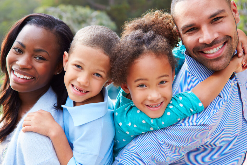 Portrait Of African American Family In Countryside