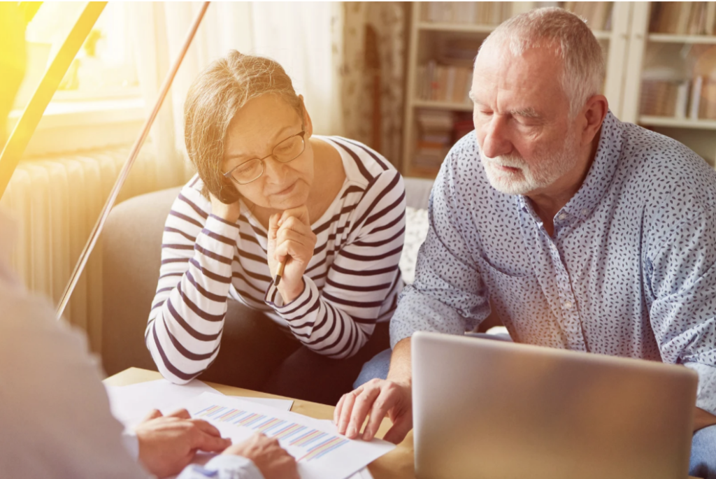 Couple comparing different pension plans