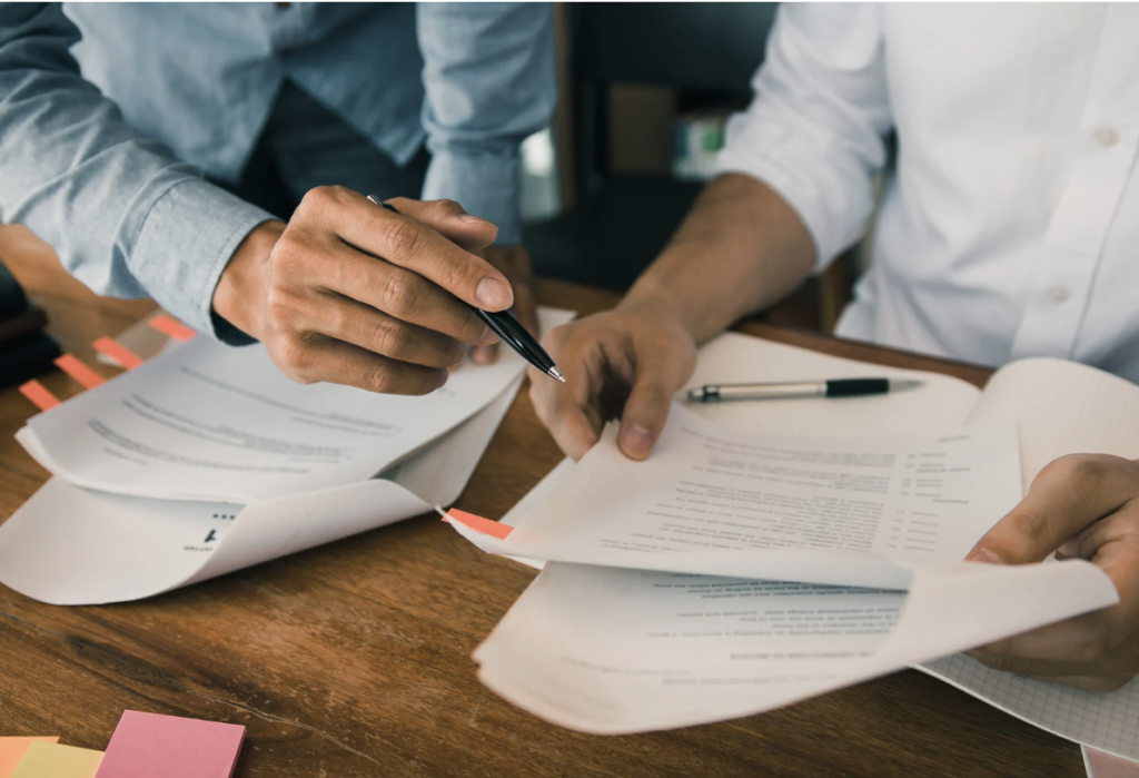 People reviewing documents